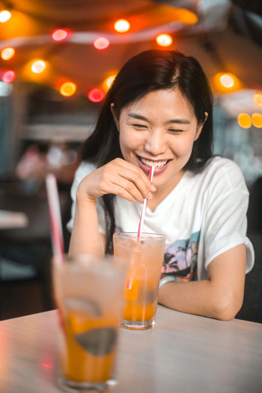 Young girl with iced tea