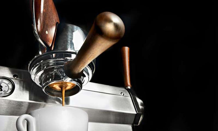 Slayer Espresso machine pulling a shot into a cup