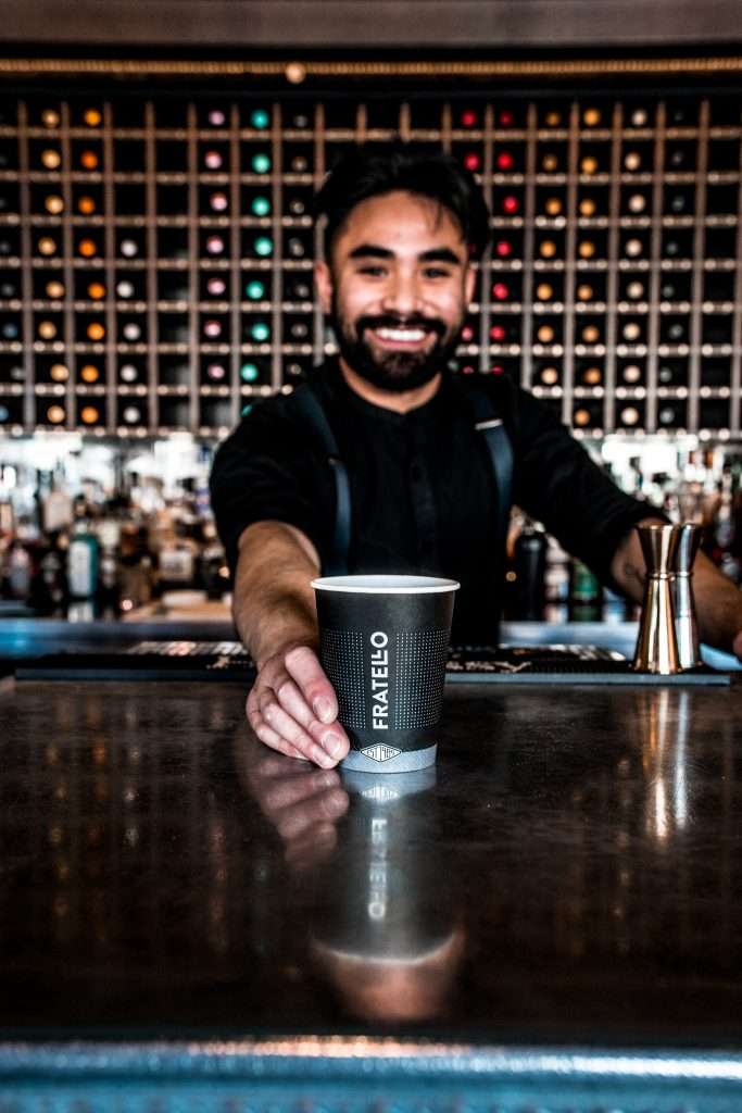 The Nash-13 | Fratello Coffee Roasters Happy chef serving coffee